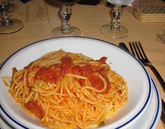 Gluten free spaghetti with tomato sauce and sausage